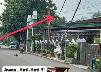 Waspada !!! Terdapat Kabel Semerawut Bahayakan Warga Dikawasan Pasar Lama Muara Enim